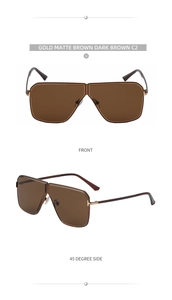 Close-up of gold metal frame and dark brown lenses on square pilot sunglasses