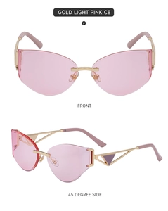 Détails de lunettes de soleil œil de chat sans monture dorées avec verres rose clair