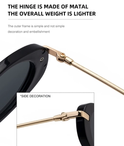 Detail view of durable golden metal hinges on black oval frame sunglasses for women
