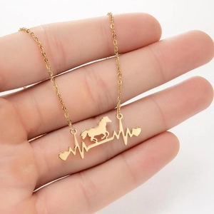 Gold minimalist necklace with a running horse silhouette and heart rhythm pendant