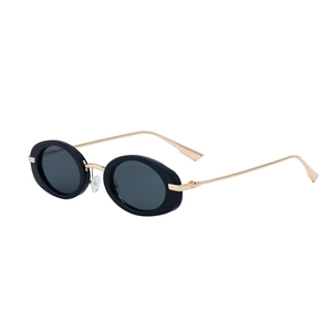 Retro oval sunglasses with thick black frames and slim gold metal temples for women