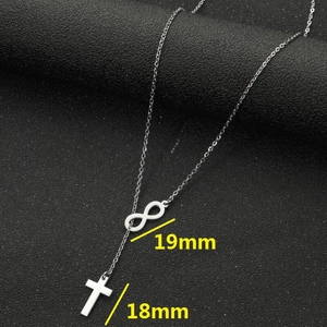 Minimalist silver infinity and cross pendant necklace with a sleek geometric double design