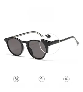Detailed close-up of durable metal hinges on round oversized fashion sunglasses