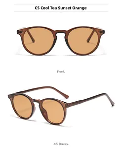 Detail view of round retro sunglasses in translucent tea with sunset orange lenses