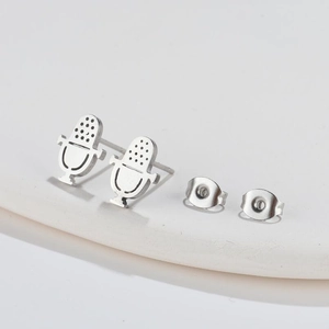 Minimalist microphone shaped stainless steel stud earrings with silver metallic luster
