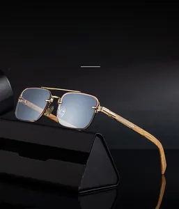 Macro shot of gold metal double bridge and wooden texture temples on frameless sunglasses
