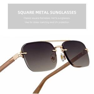 Detail view of gold metal hinges and wood grain texture temples on rimless sunglasses