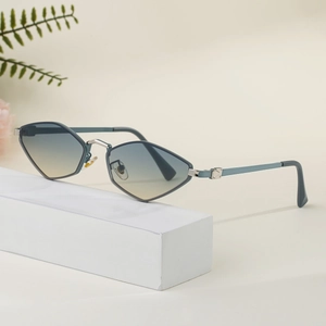 Polygonal geometric sunglasses with blue-yellow gradient lenses on a white pedestal
