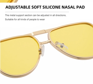 Détail des plaquettes de nez en silicone souple sur monture dorée de lunettes