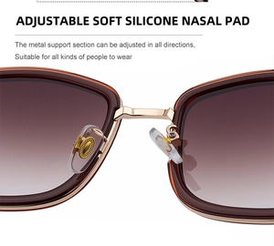 Detail of adjustable soft silicone nose pads and gold metal bridge on square sunglasses
