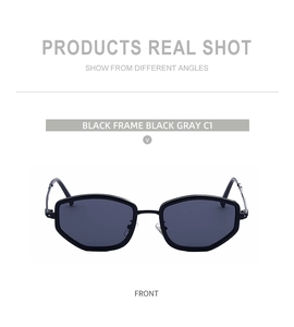 Front view of square black sunglasses with geometric lenses and metal nose pads