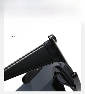 Close-up of durable hinge construction and thick frame of black sports sunglasses
