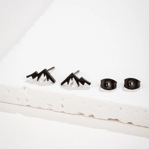 Minimalist black snow mountain peak stud earrings in stainless steel on stone