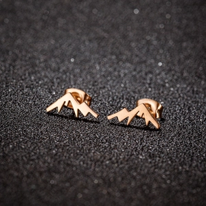 Minimalist mountain peak stud earrings in gold finish with smooth polished surface