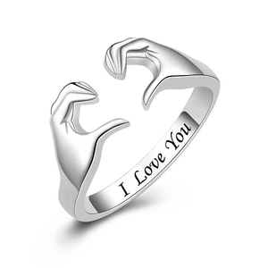 Romantic silver heart hands open ring with I Love You engraving on white background