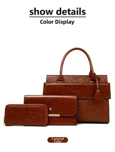 Detailed view of 3-piece caramel tote bag set featuring faux crocodile texture and hardware