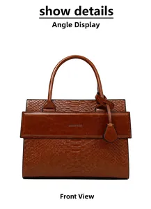 Front view of vintage brown satchel with faux snake skin texture and smooth leather