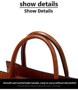 Detailed close-up of brown crocodile texture leather handle with high-quality edge finish