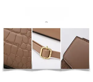 Detail of brown crocodile embossed leather with gold hardware and fine edge stitching