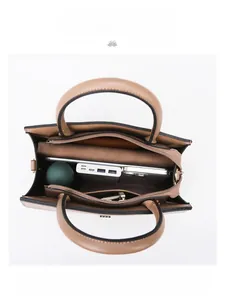 Interior view of brown stone-pattern tote showing large capacity for iPad and essentials