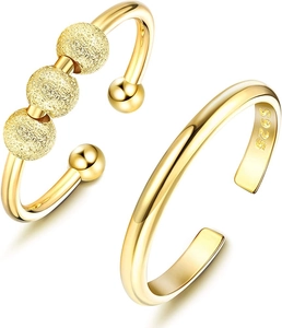 Detail of S925 engraved stamp and matte gold beads on adjustable fidget ring set