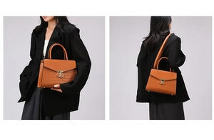 Detail of caramel leather handbag featuring crocodile pattern and gold metal lock clasp