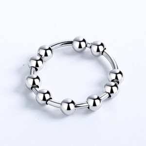 Detail shot of a silver fidget ring with ten movable smooth beads for stress relief