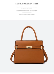 Détail du sac à main en cuir orange avec fermoir tournant doré et texture grainée élégante