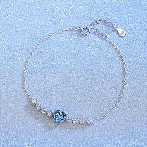 Elegant S925 silver bracelet with a blue heart zircon stone and sparkly accents