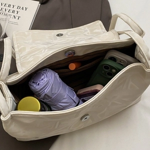 Large capacity cream white tote bag with magnetic closure showing spacious interior storage