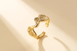 Detailed macro shot of the molten lava texture on the gold adjustable open ring