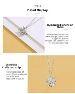 Detail showing the 925 sterling silver windmill pendant with adjustable extension chain
