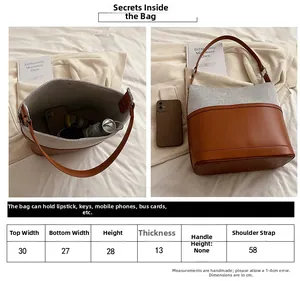 Detailed size chart for large canvas bucket bag with precise dimensions and handle measurements