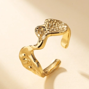 Minimalist gold open ring with irregular hammered texture and molten lava design