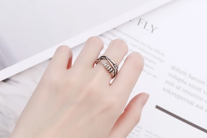 Detailed close-up of S925 sterling silver multilayer ring with rotating relief beads