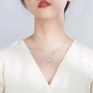 Rotating windmill necklace with sparkling crystals on a silver chain for women