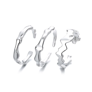 Set of three irregular S925 sterling silver open rings with minimalist textured finish