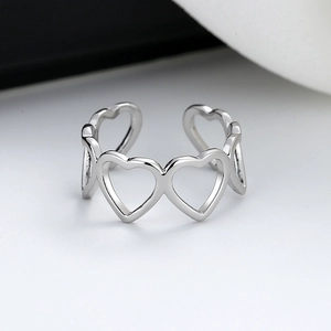 Polished silver adjustable open ring with minimalist continuous hollow heart patterns