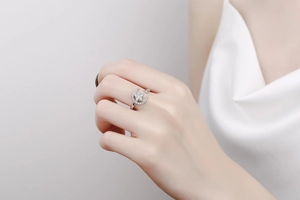 Detailed close-up of a silver moon and star open ring with sparkling white zircons