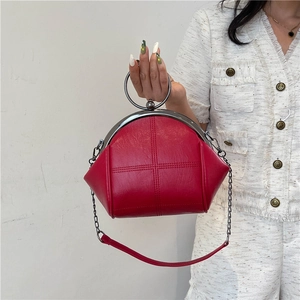 Red retro kiss-lock shell bag with metal ring handle and chain strap for women
