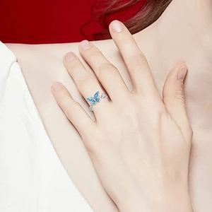 Bague ouverte papillon rotative élégante en argent avec ailes bleues et pierre zircon