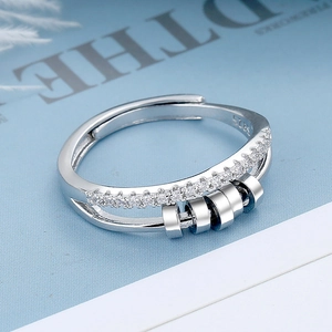 Rotating S925 silver fidget ring with zircon pavé and movable beads for stress relief