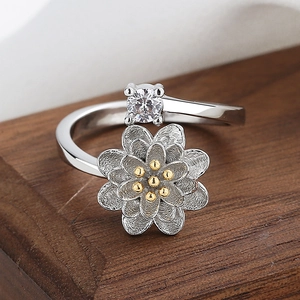 Elegant rotating sunflower ring with lotus petals and a sparkling zircon center stone