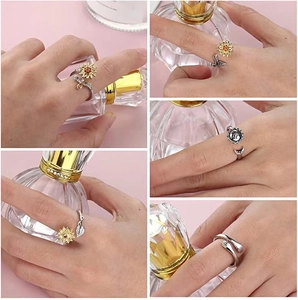 Detail of adjustable rings with sunflower and bee motifs on elegant pink background