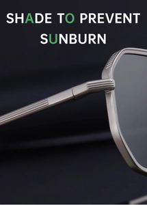 Detail of matte silver metal hinge with textured stripes and grey polarized lens
