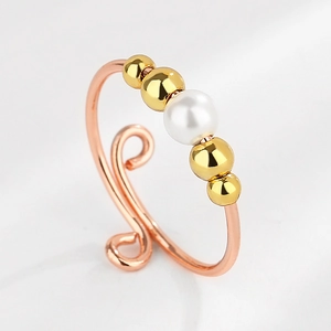 Rose gold adjustable open ring featuring four golden beads and a central white pearl