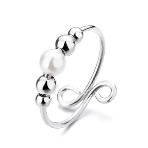 Silver adjustable ring featuring five beads with a central white pearl on a plain white background