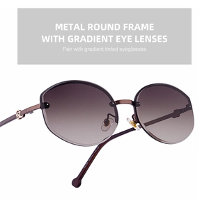Macro detail showing metal round frame with gradient purple lenses on fashion sunglasses