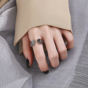 Retro fist-shaped open ring for men featuring silver-toned metal in hip hop style