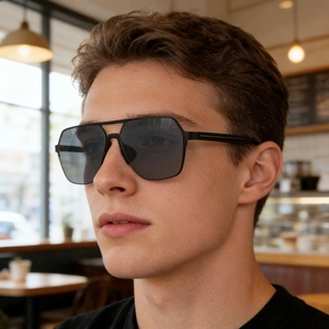 Detail of square sunglasses with double-bridge metal frame and polished grey lenses